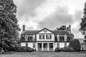 Upper level of porch on 1750s gambrel-roof house enclosed in 178